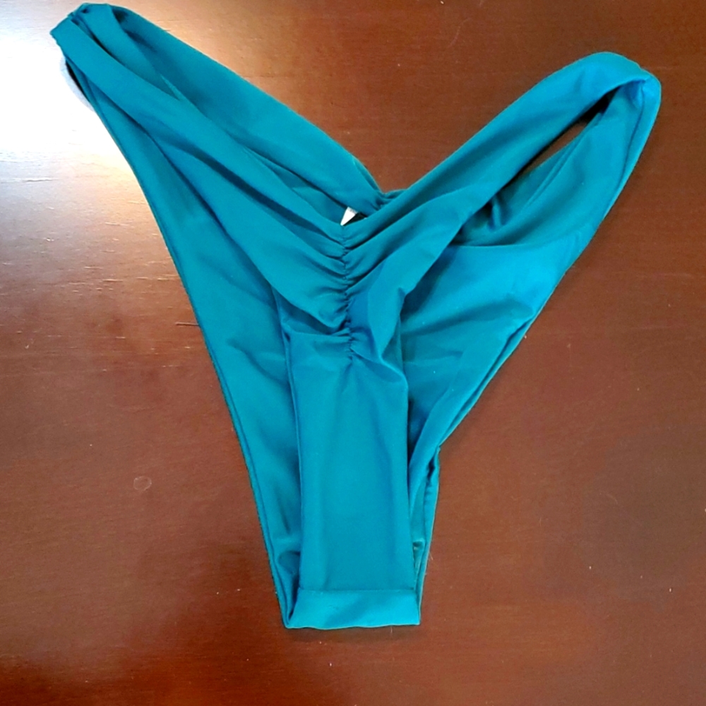 New Pretty little thing teal colored high cut Bikini bottoms size 4